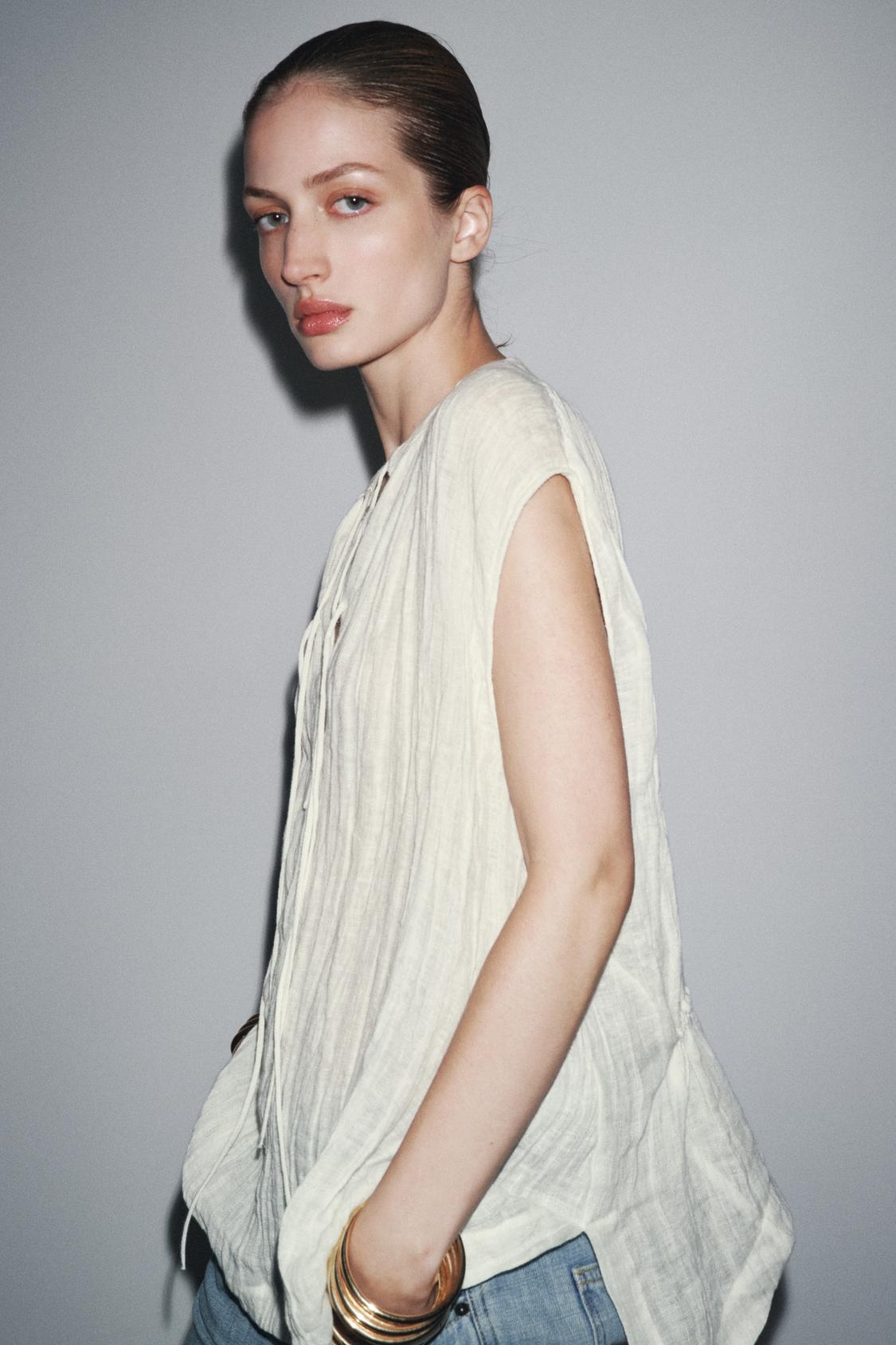 Blusa sin mangas de lentejuelas